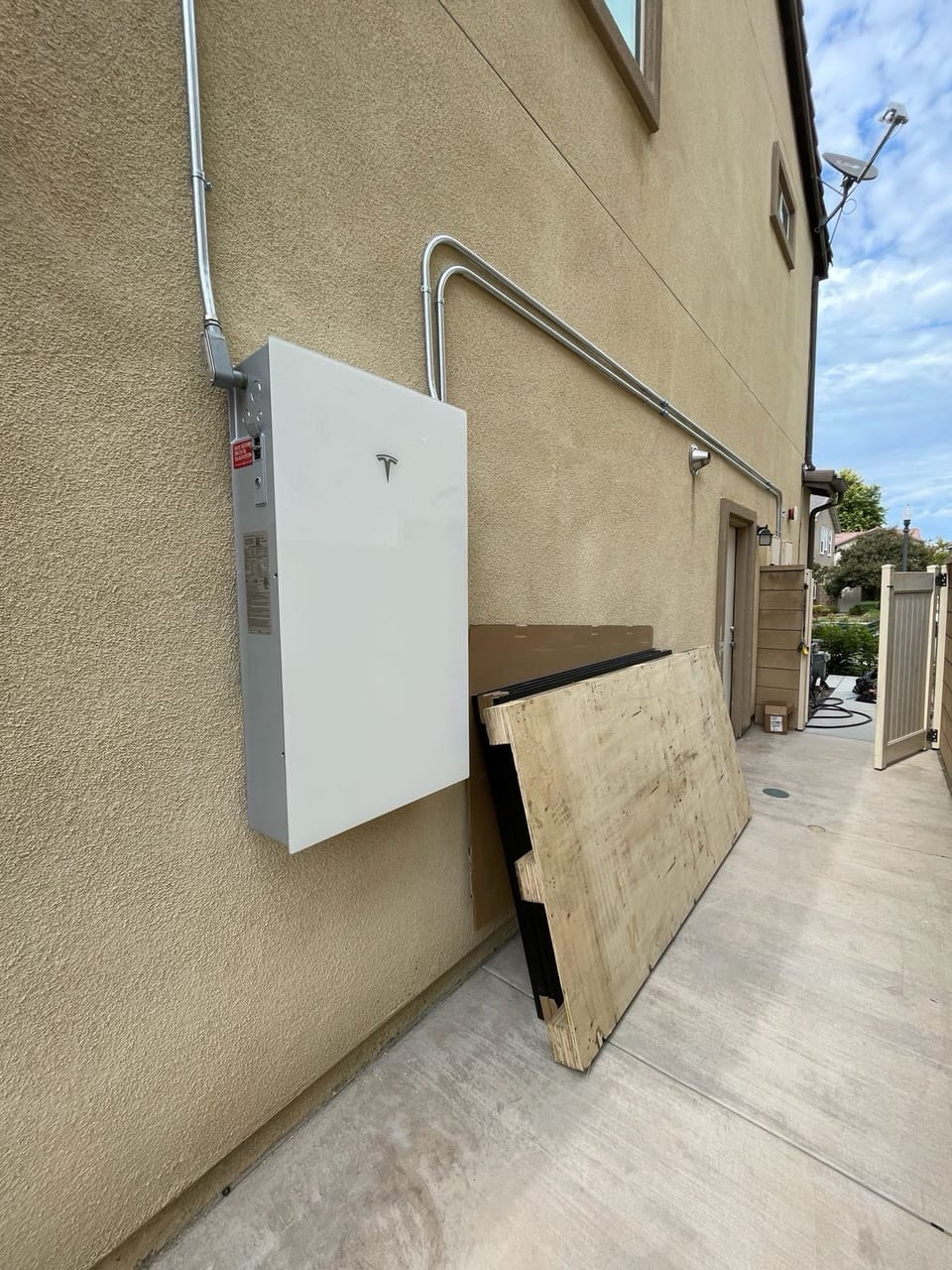Solar system electrical box mounted on a stucco wall