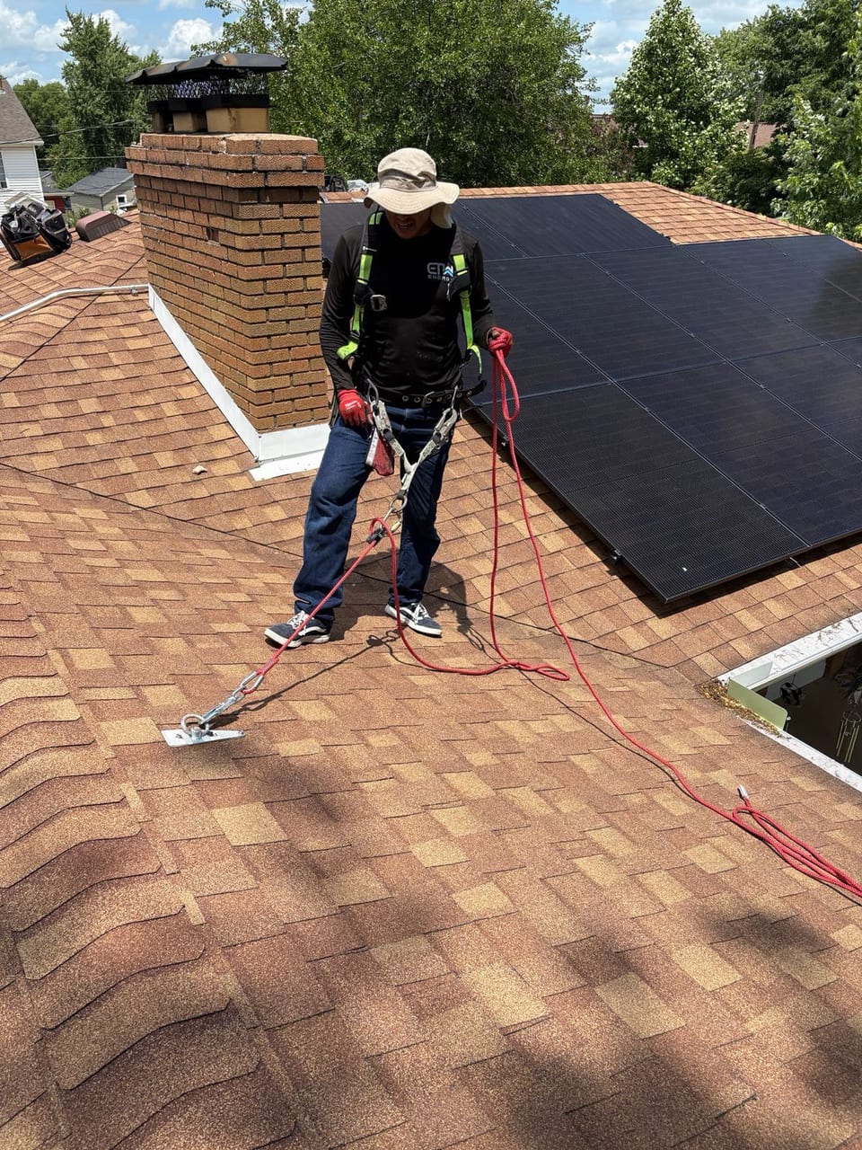 ETW Energy installer working on a rooftop solar installation