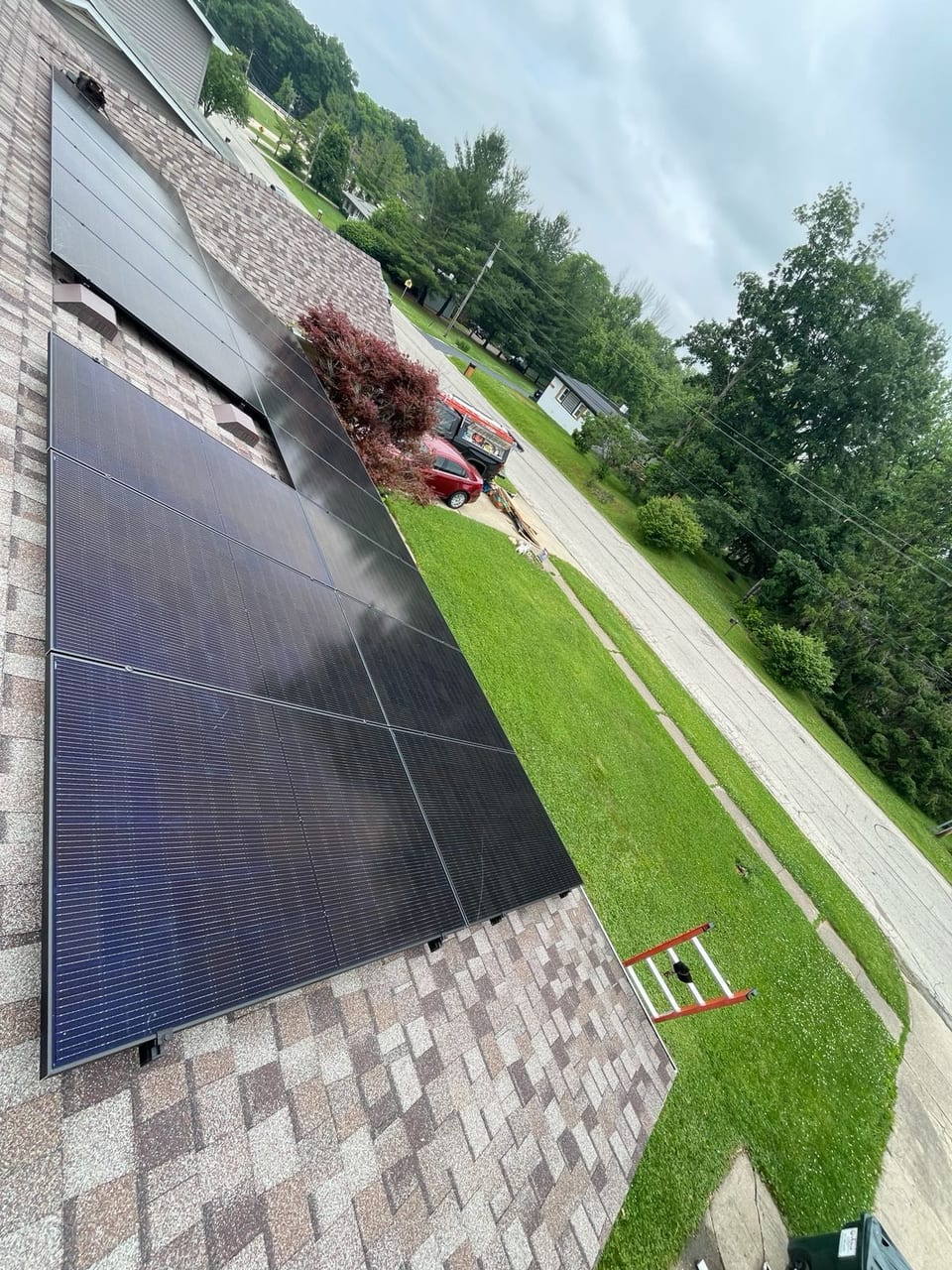 Solar panel array on a residential roof on a sunny day
