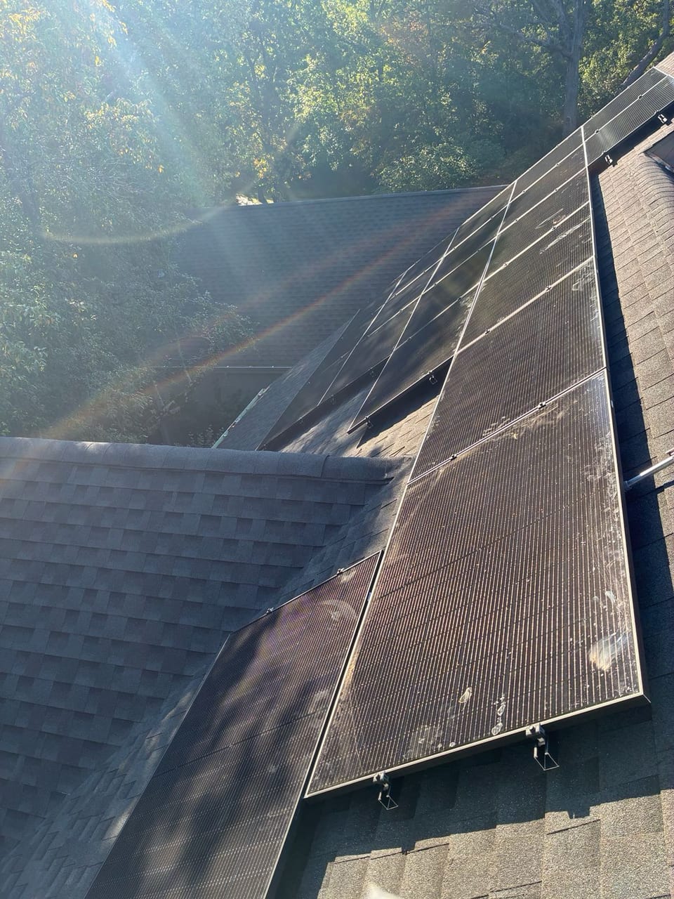 Sunlight reflecting off a rooftop solar array