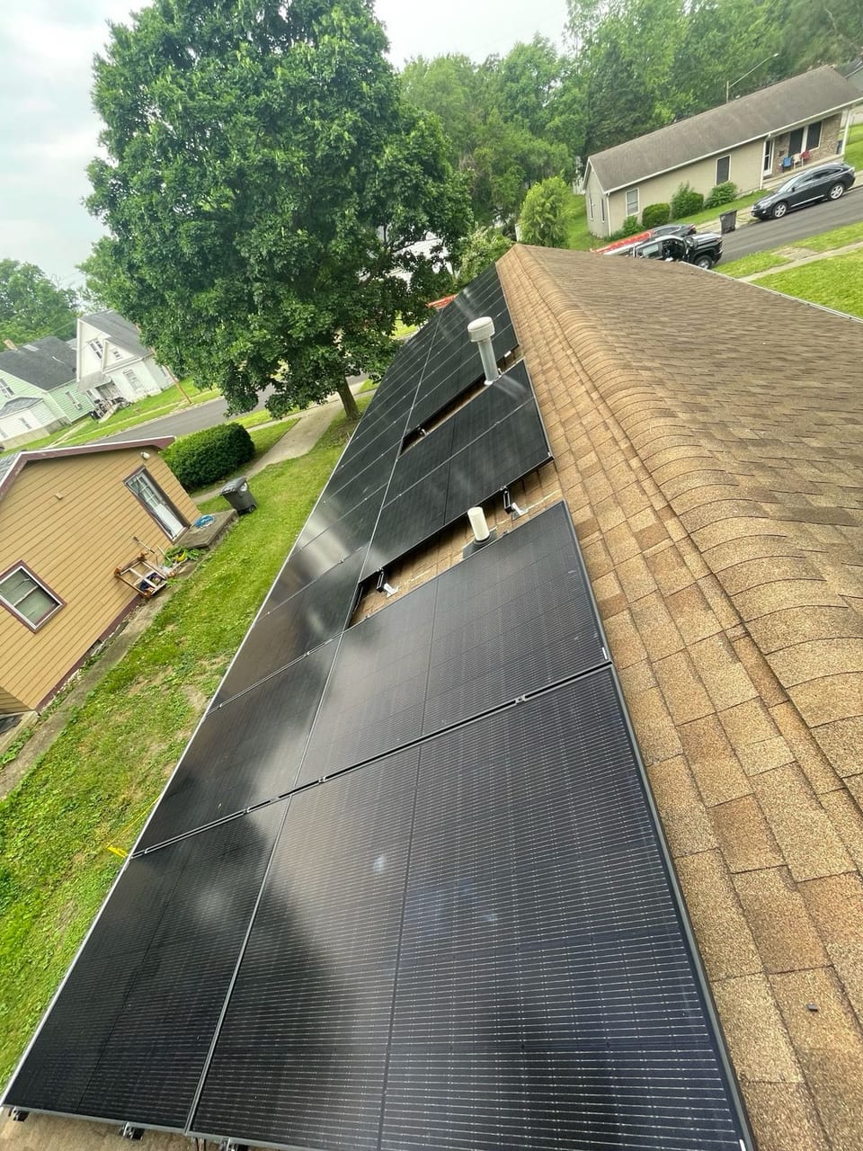Long solar array running along a residential rooftop